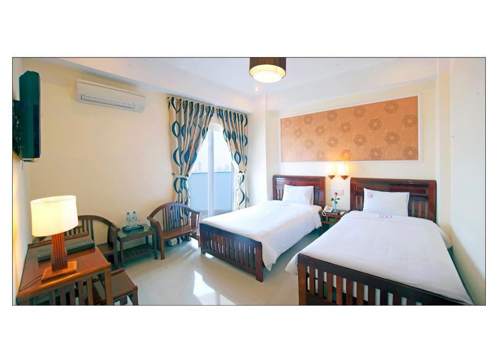Bien Vang Hotel Da Nang Quarto foto